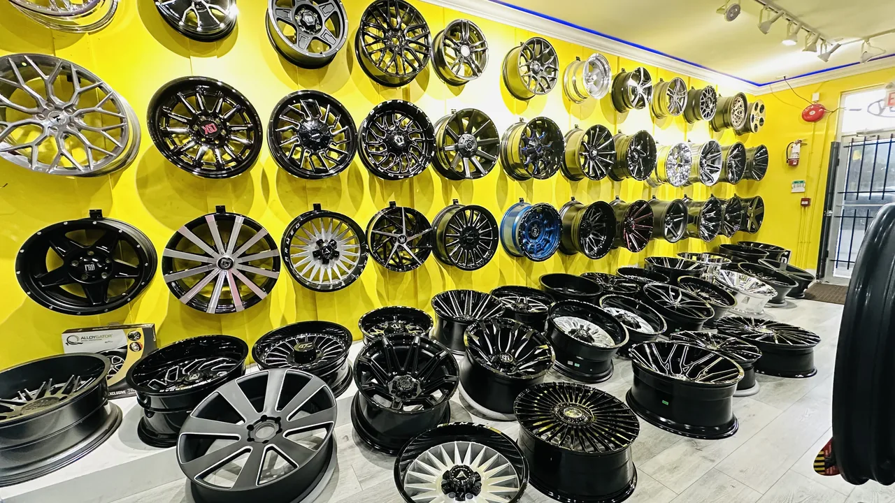 Custom wheel display inside a Surrey Wheels & Tires showroom